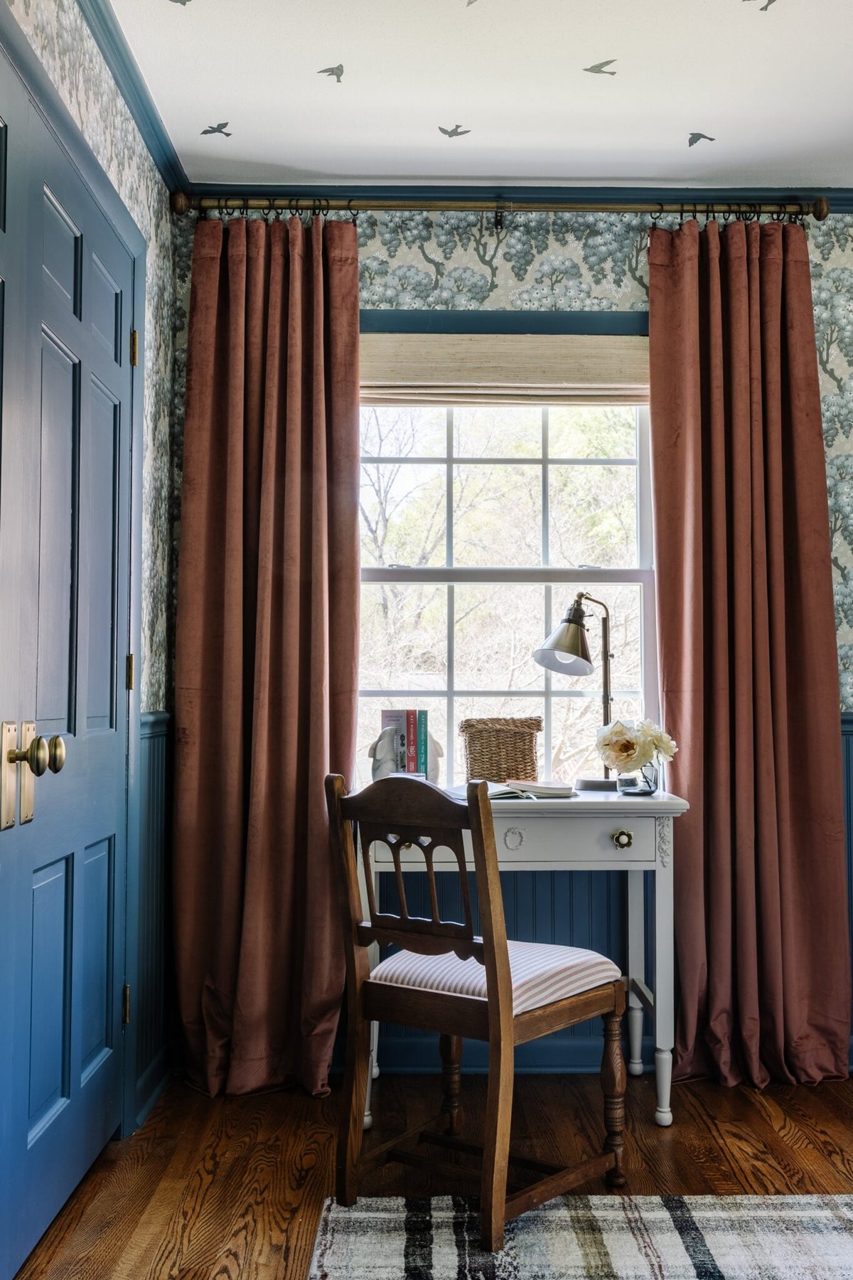 vintage chair at a desk in a girl's bedroom