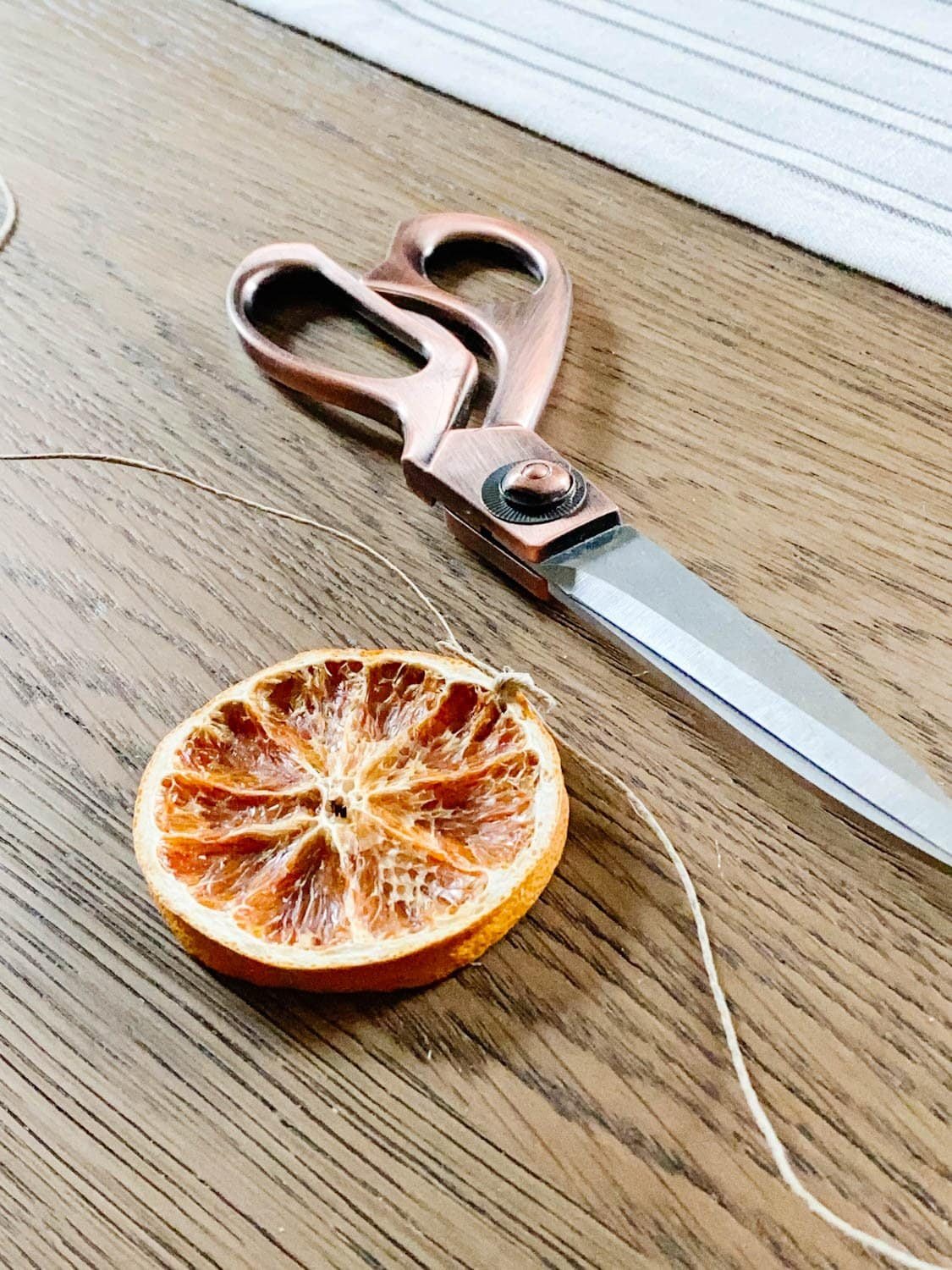 cut twine for hanging dried orange slices