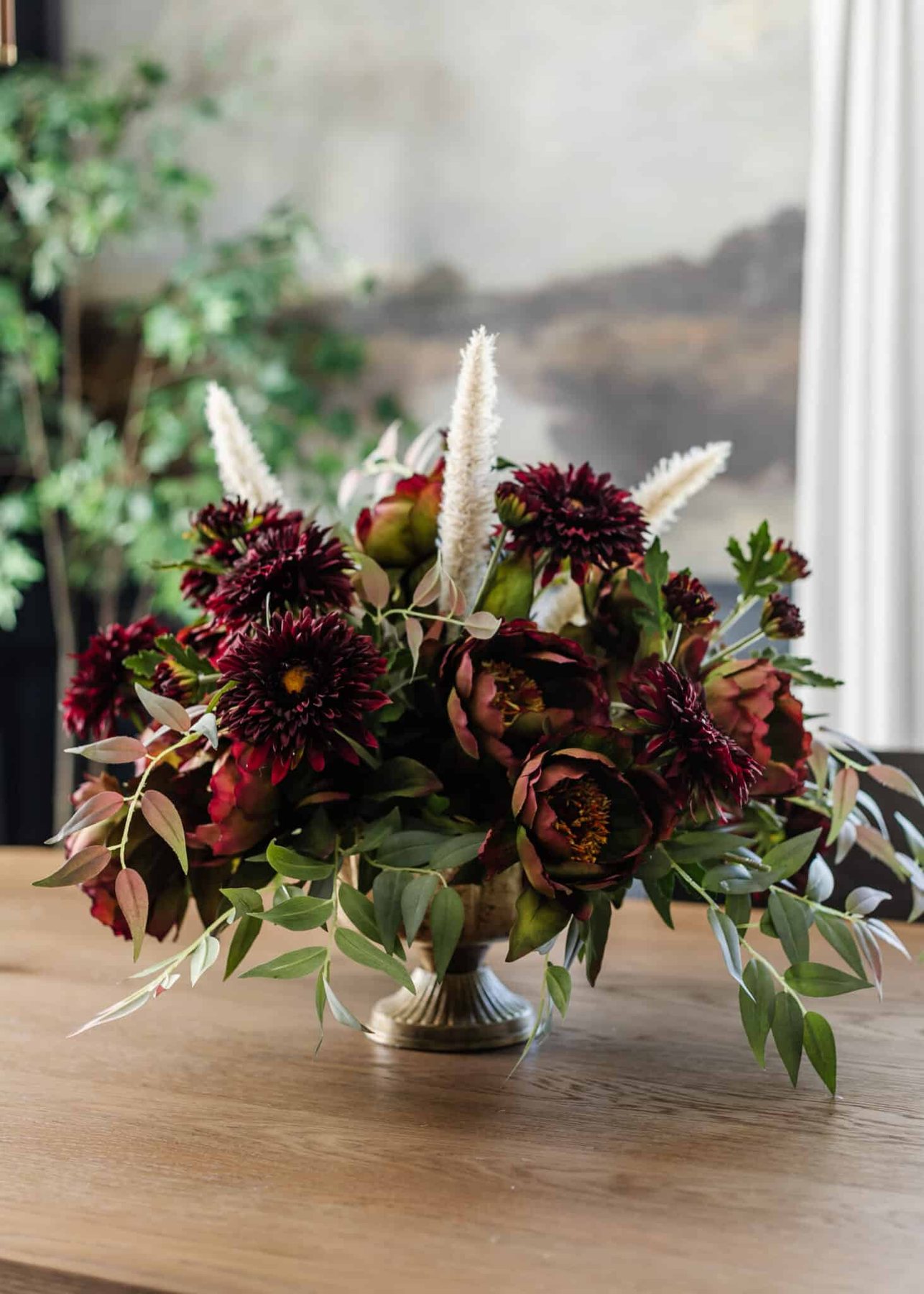 burgundy and purple fall floral arrangement