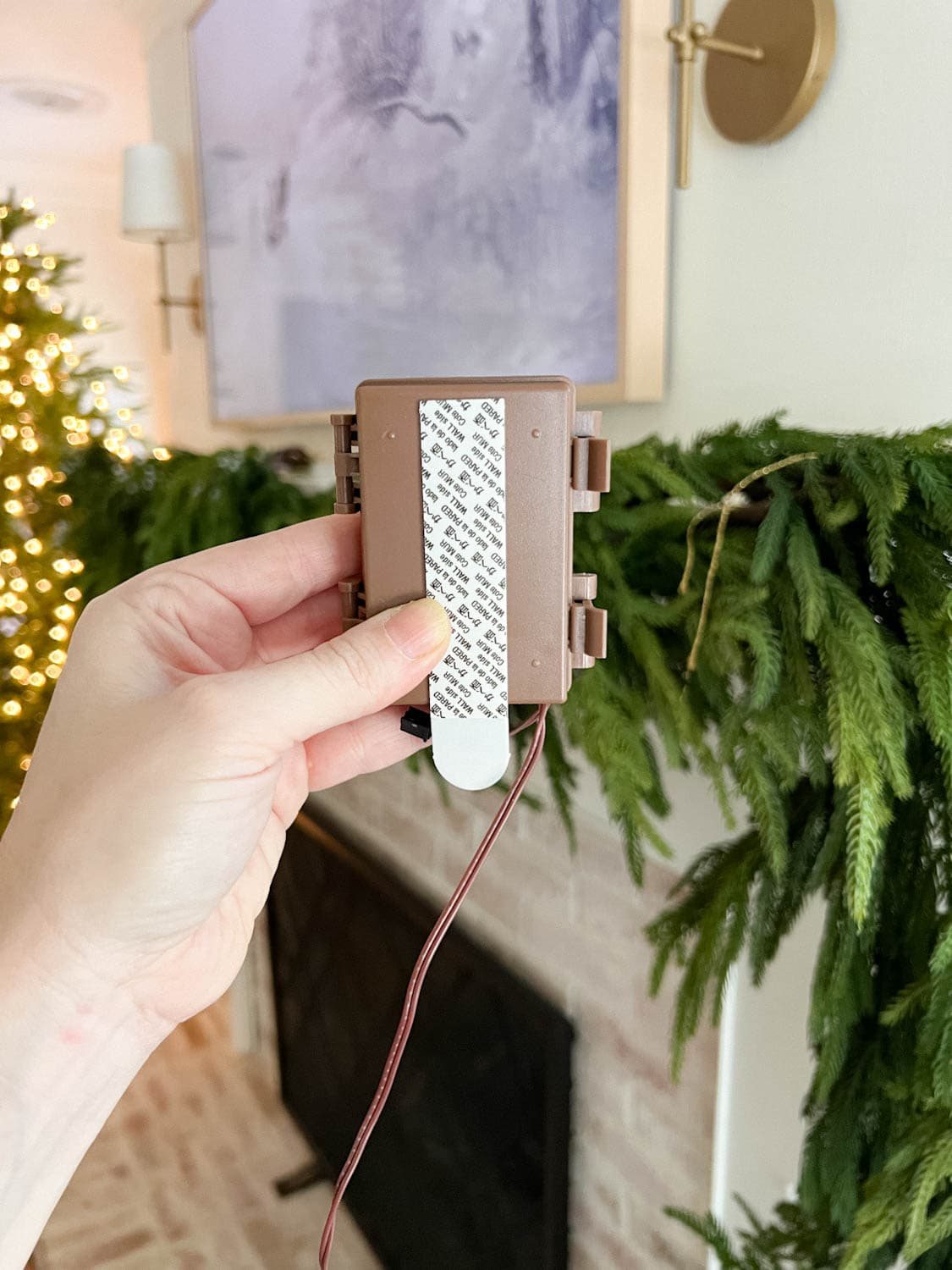 mounting battery operated Christmas lights with a Command hanging strip