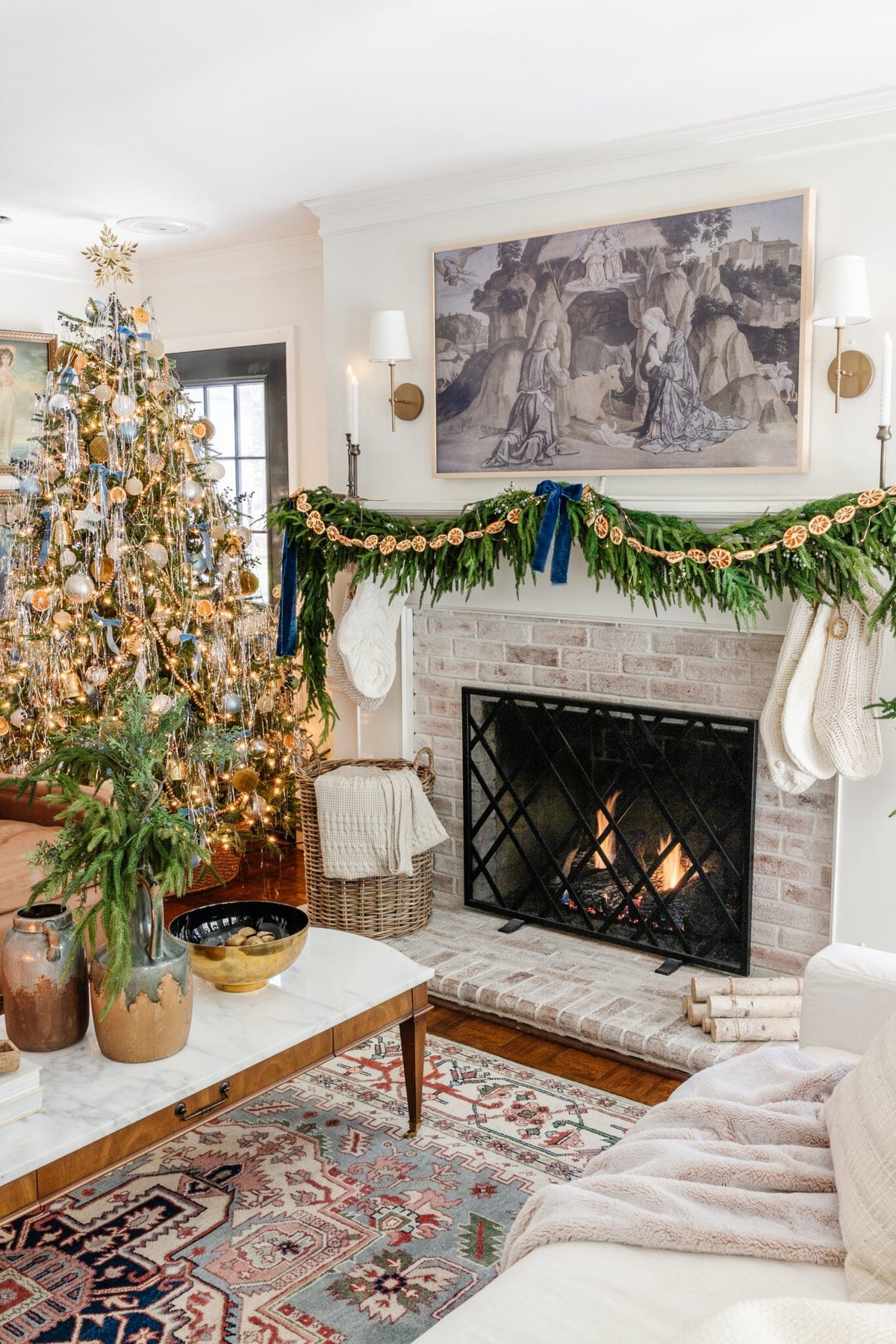 Christmas fireplace decor with limewashed brick and tinsel Christmas tree in living room
