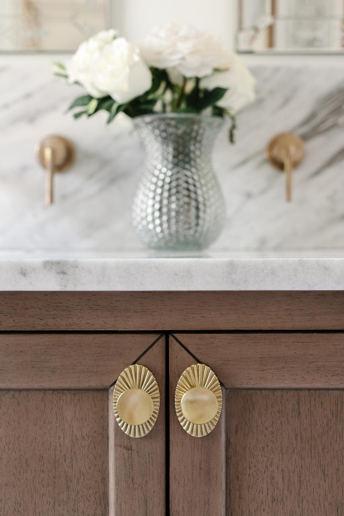how to make your house look expensive - swap out hardware on cabinets