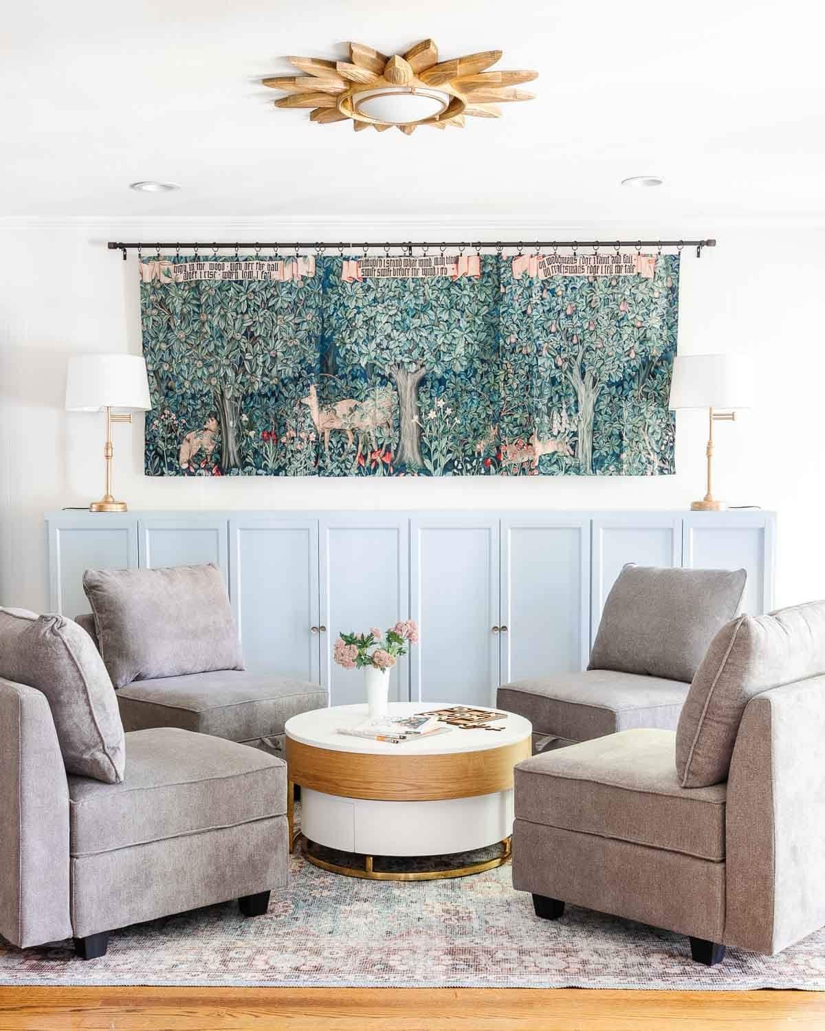 trying on washable rugs in a playroom makeover