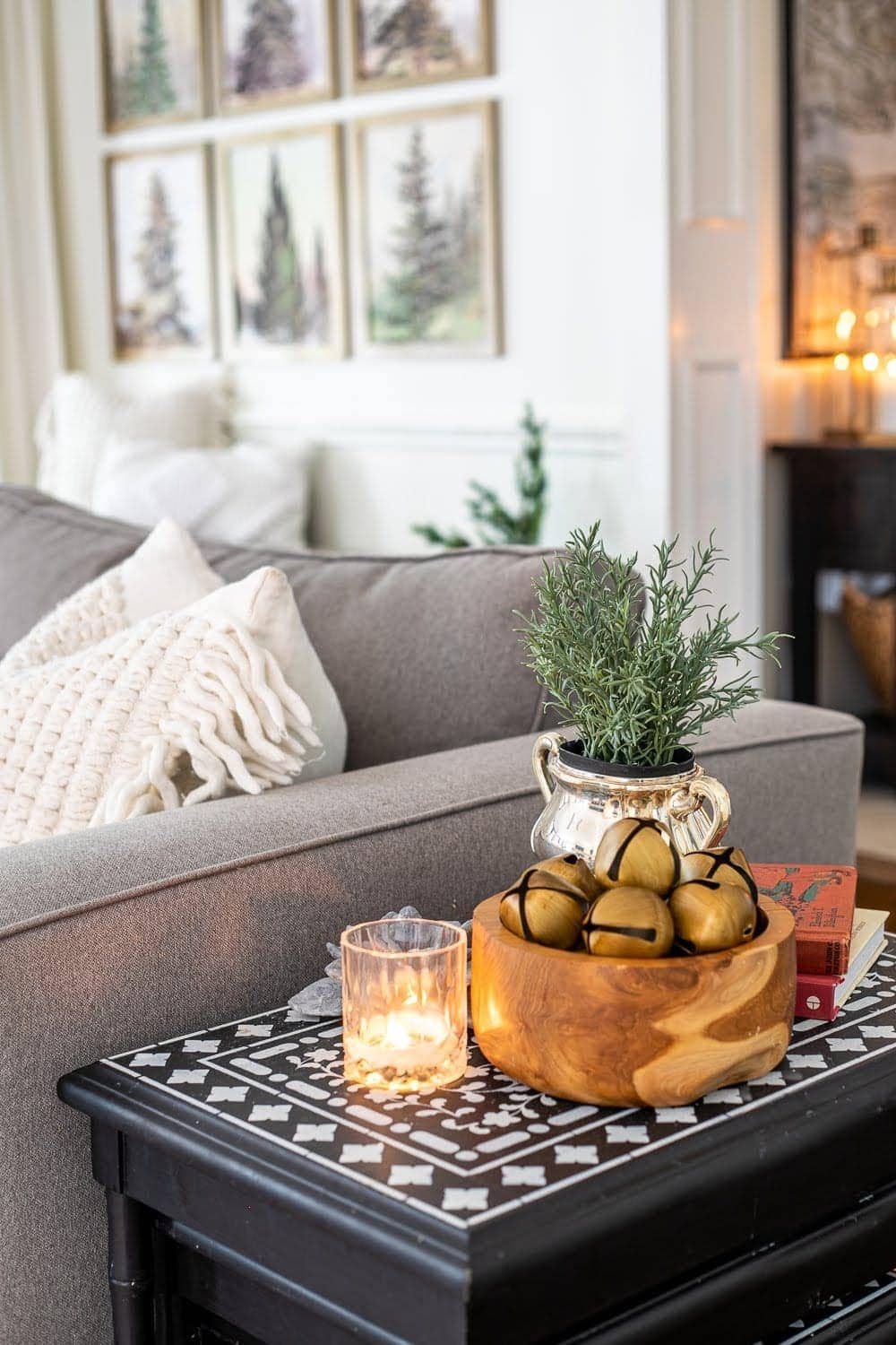 Repurpose family heirloom vessels by displaying them with greenery stems or flowers as vases.