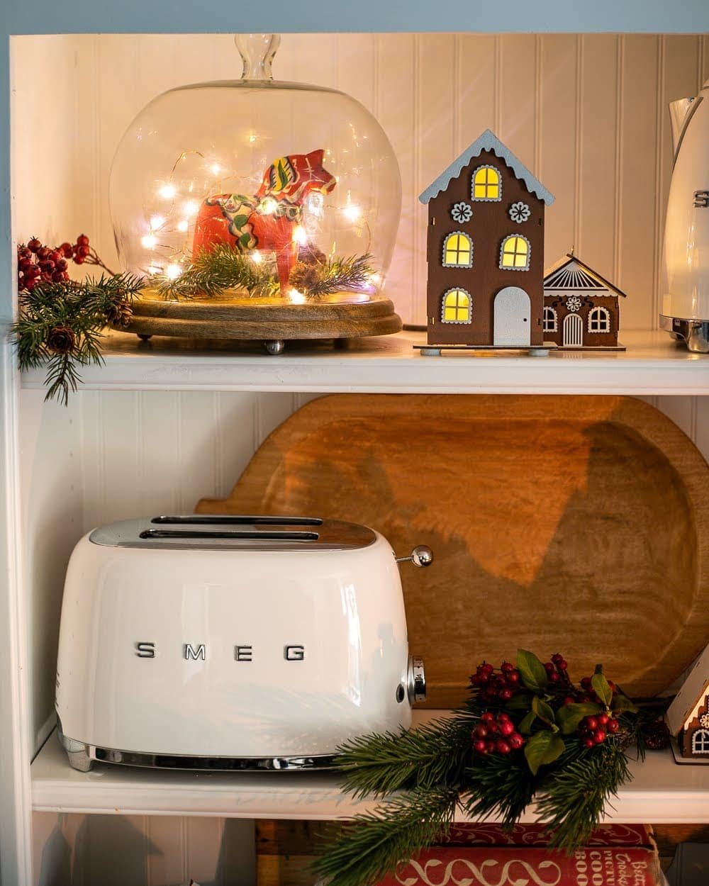 Swedish Christmas kitchen shelves styled with Dala horse and gingerbread