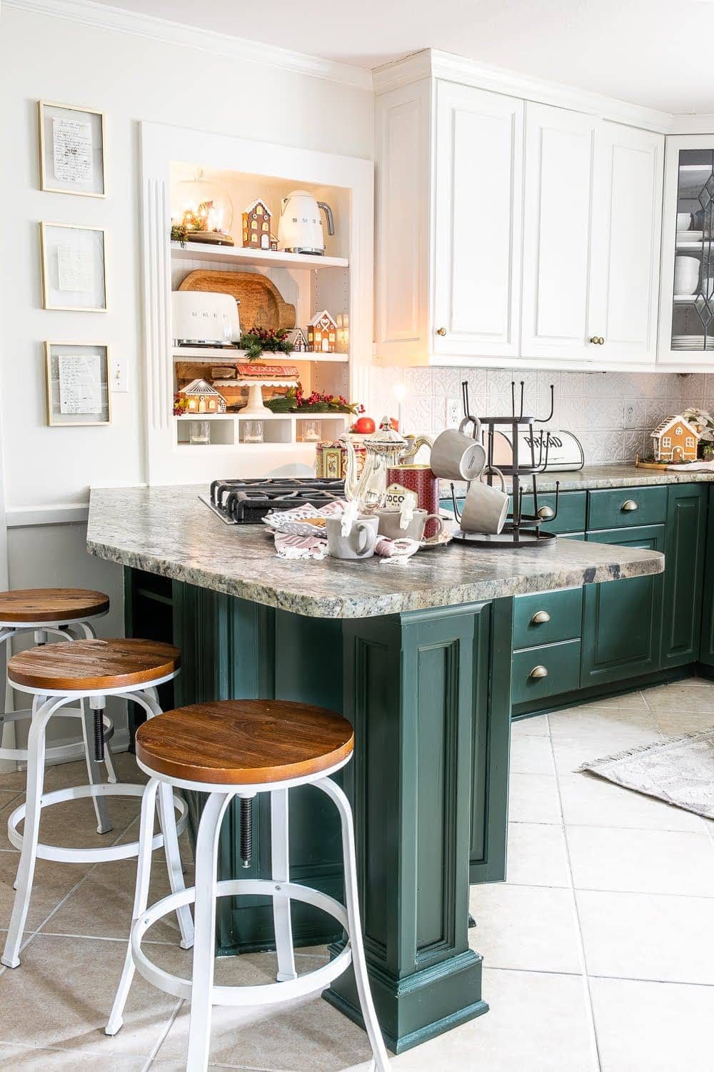 Christmas kitchen with hot cocoa station and styled shelves with gingerbread.