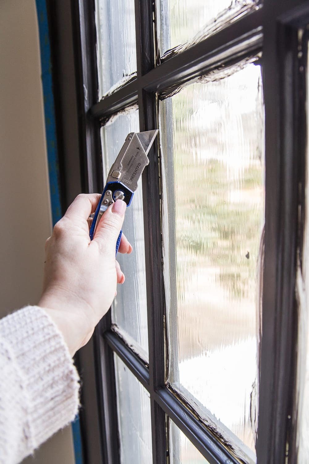 scoring edges of mask and peel to paint French doors