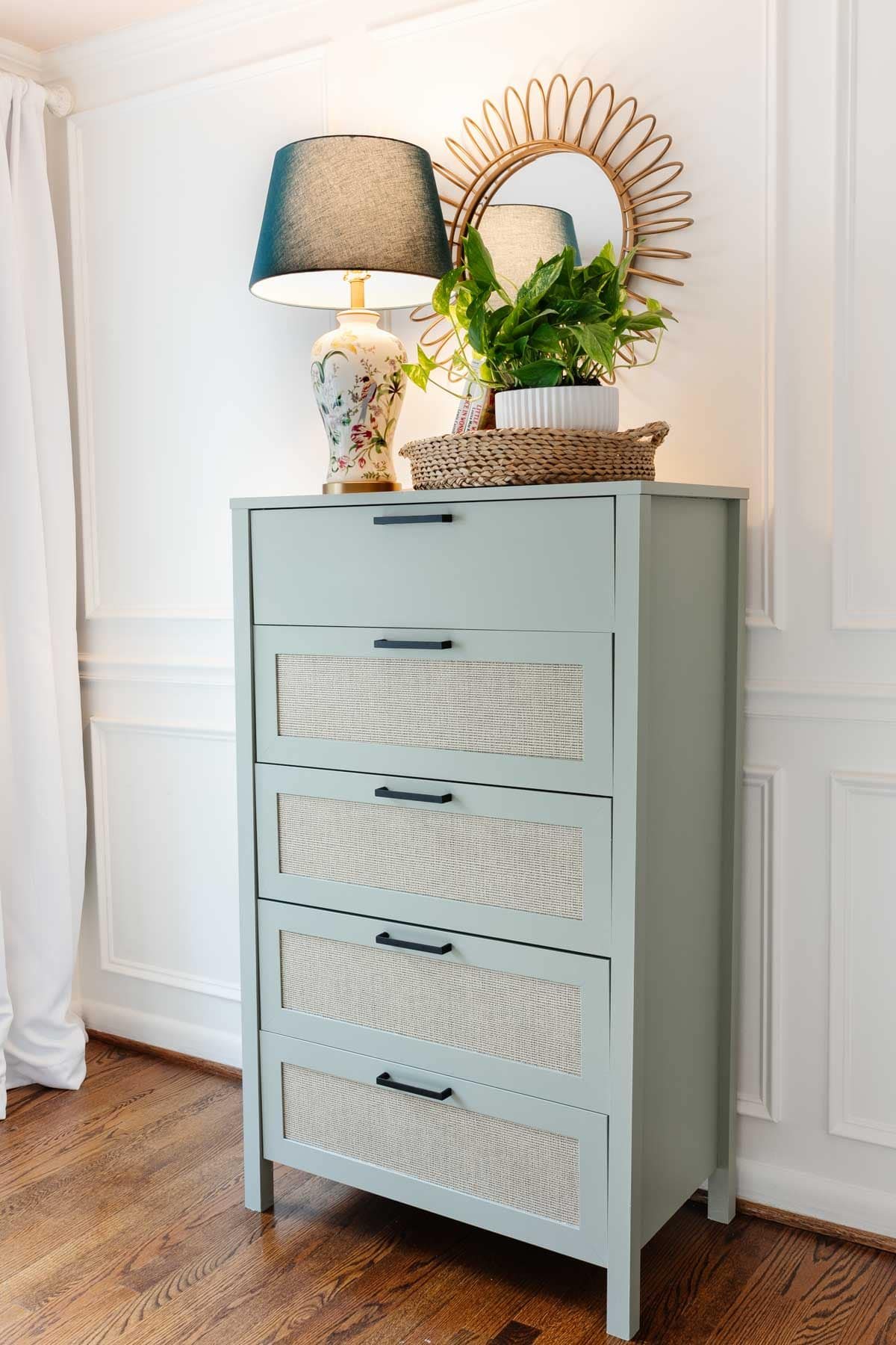 sage green dresser in a little girls room