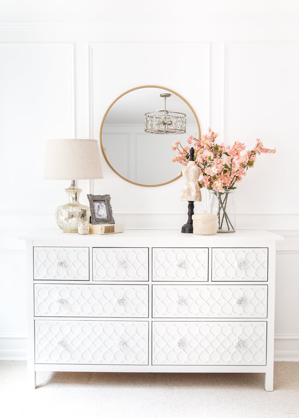 How to get a high-end carved detail look for less on a plain IKEA Hemnes dresser using appliques.