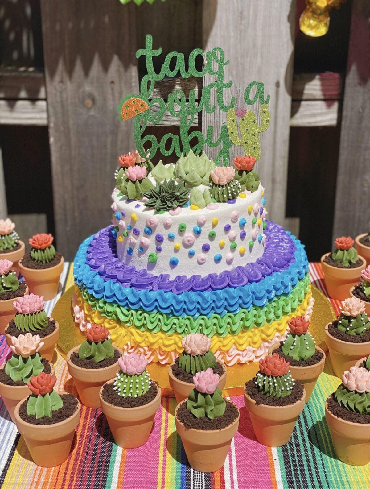 Fiesta themed baby shower cake with DIY mini cactus cupcakes