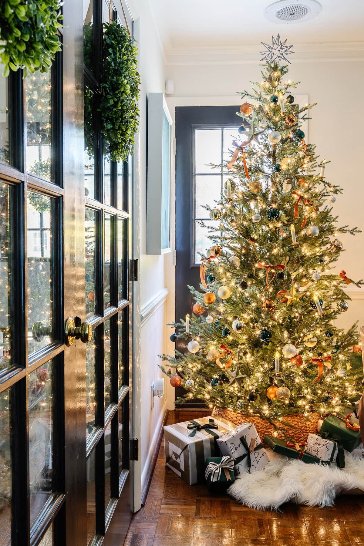 Christmas tree bows with antique style battery candles for a vintage, feminine look