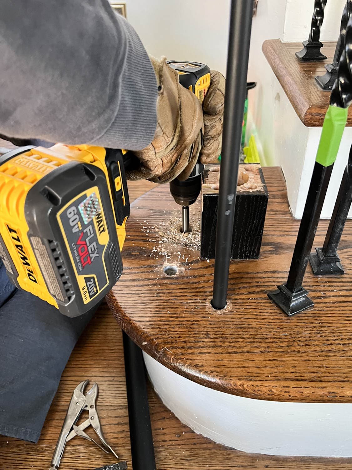 drilling new baluster holes on stair treads with a forstner bit
