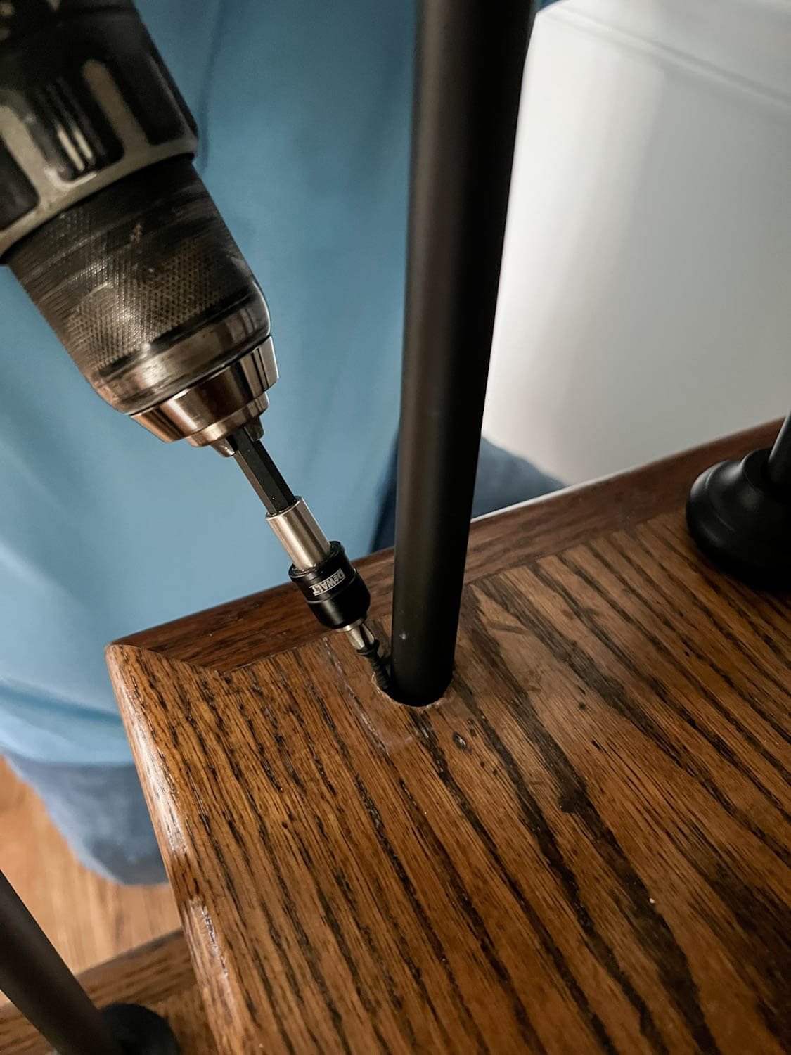 drilling screw in stair tread to secure stair baluster