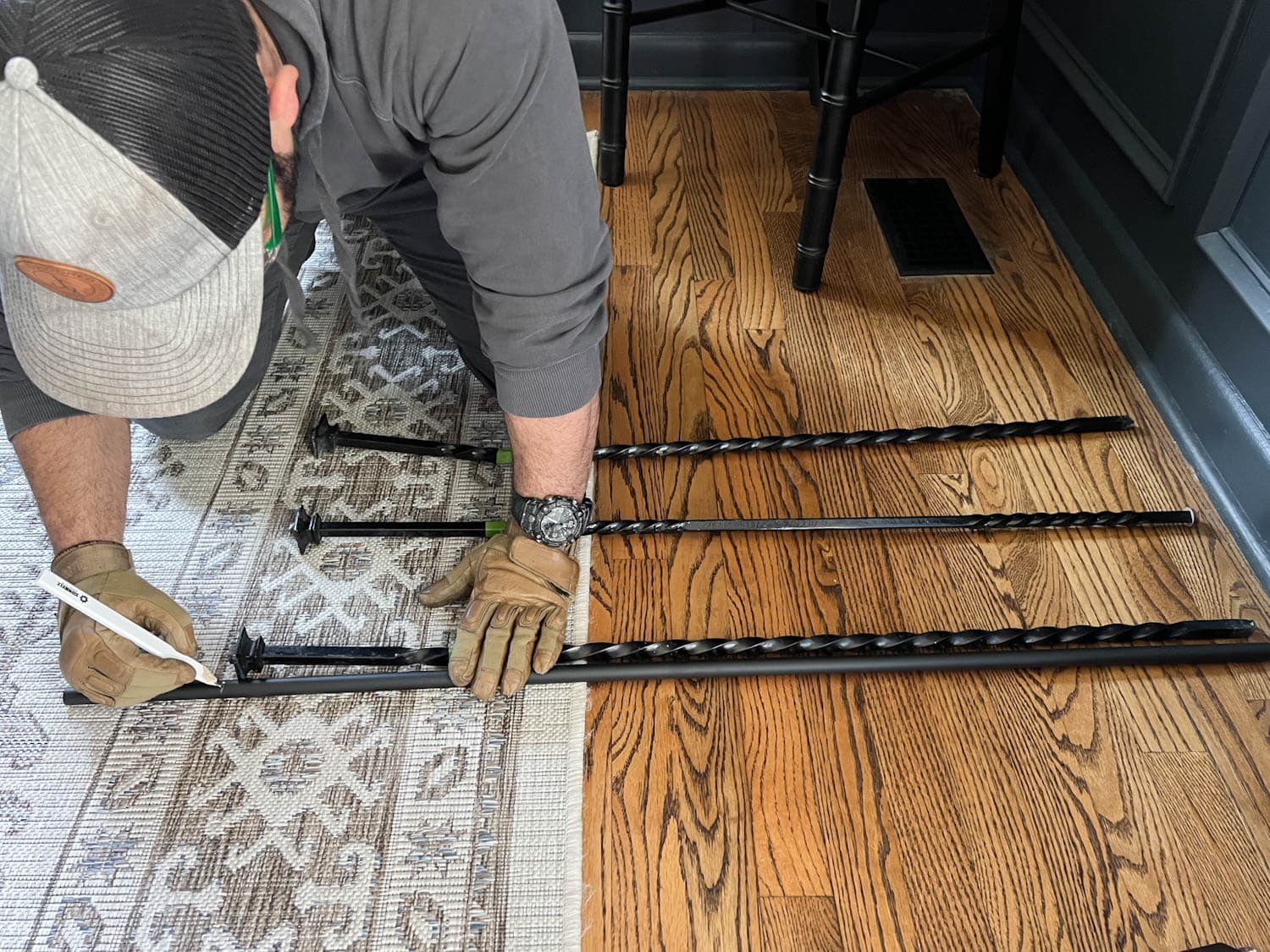 measuring and marking new stair spindles