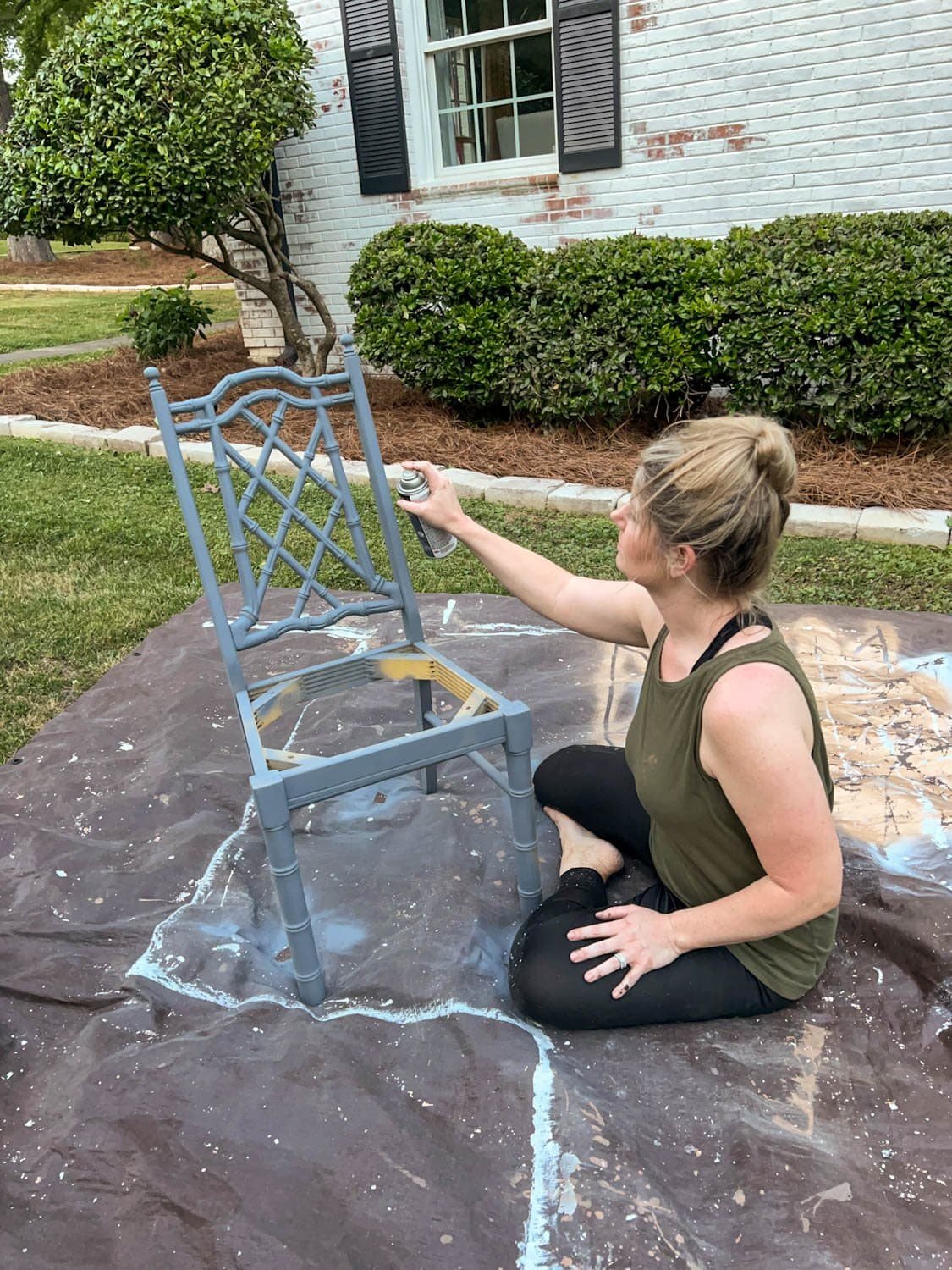 spray priming a bamboo chair