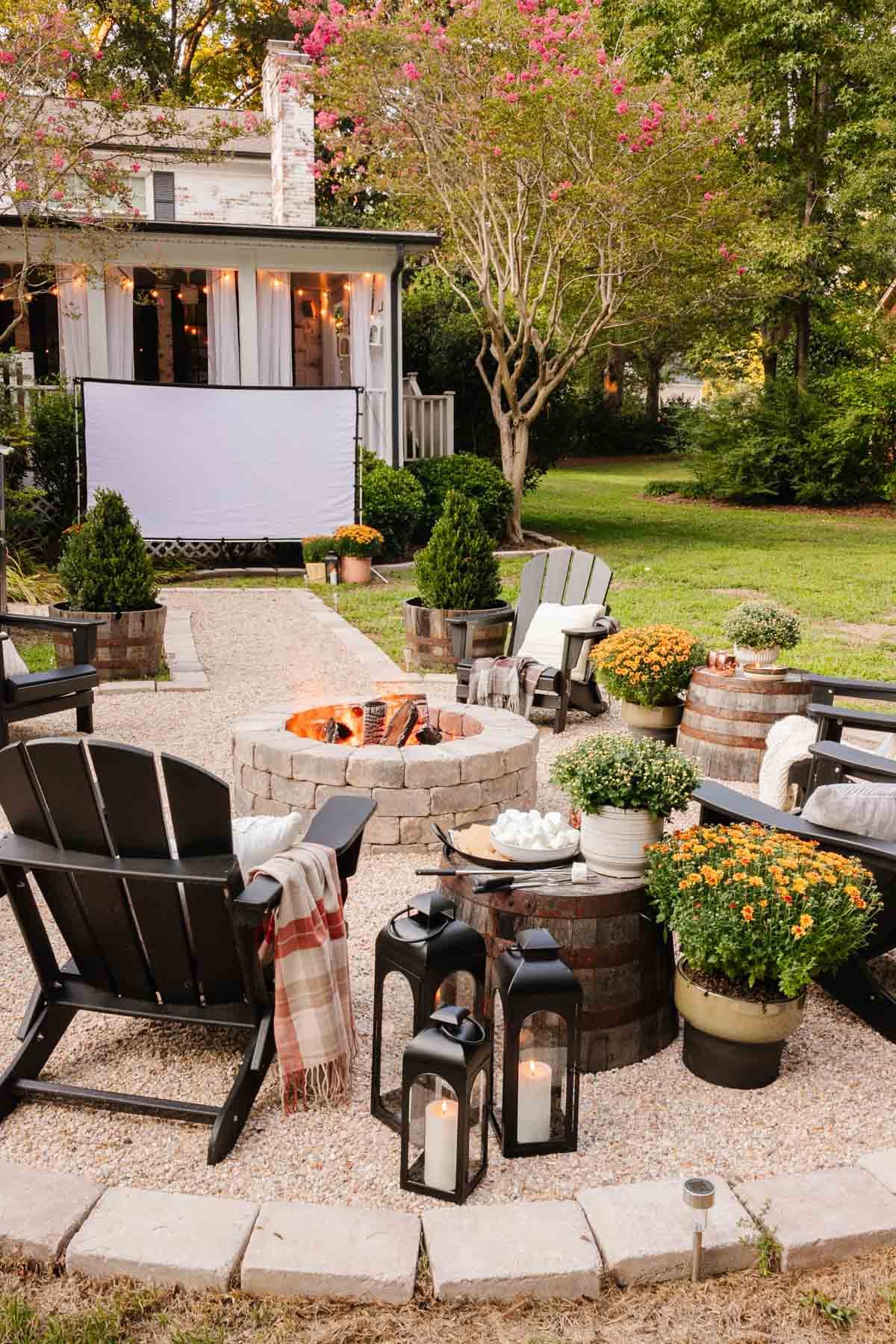 DIY fire pit with outdoor fall decor for a cozy backyard party