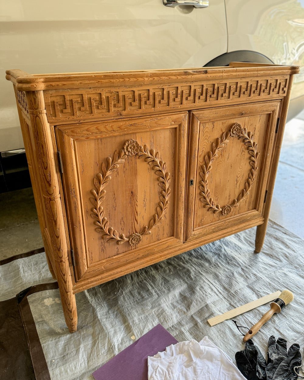 orange wood cabinet before applying gel stain