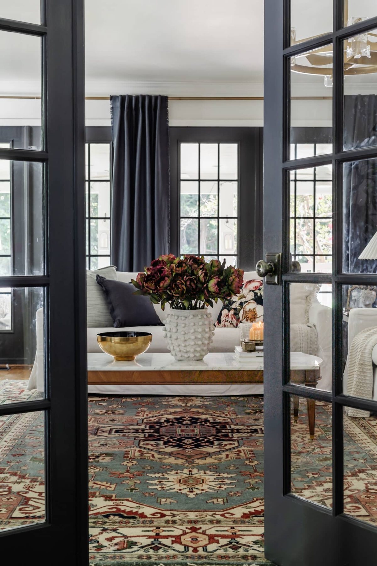french doors leading into a living room decorated for fall