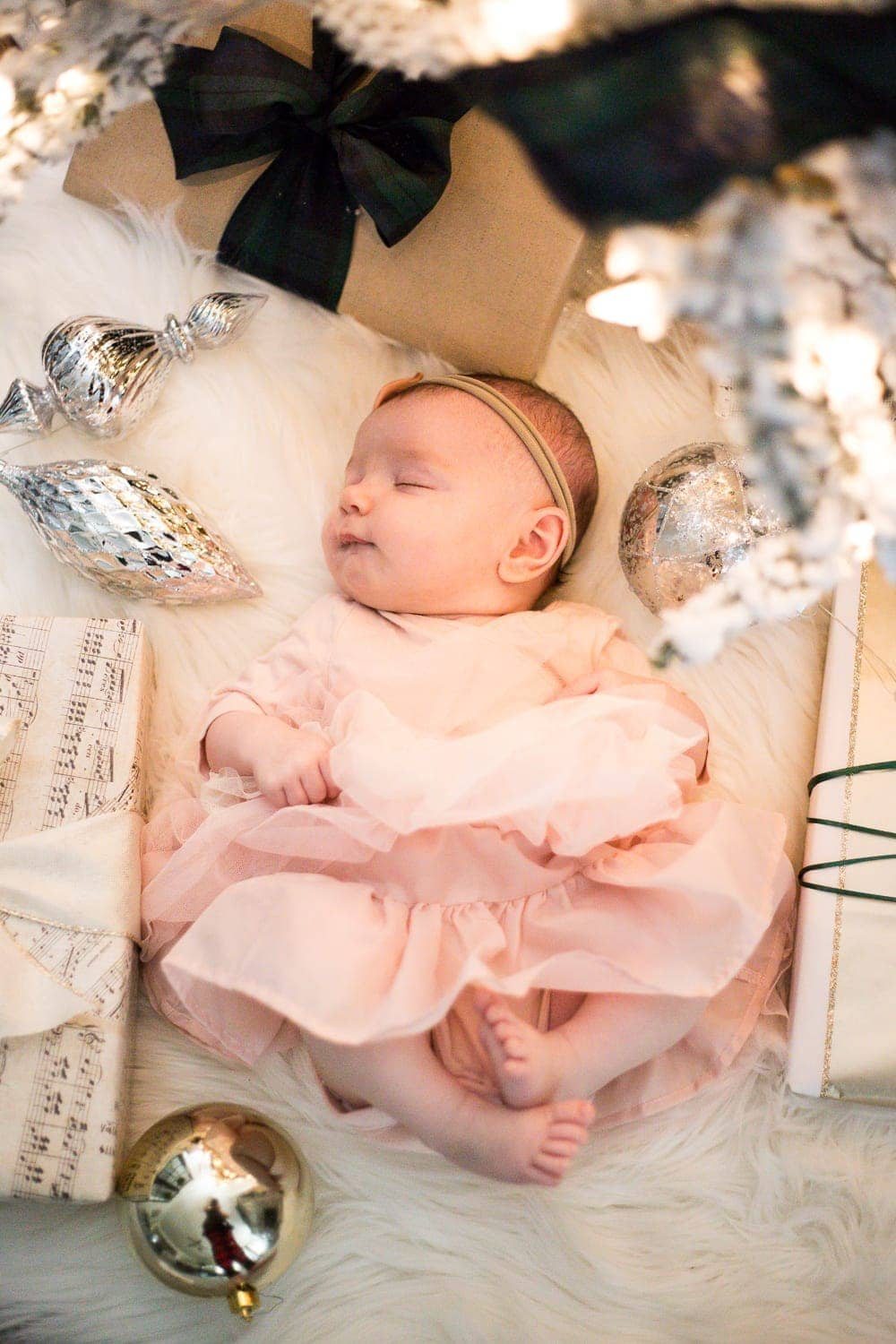Baby's First Christmas photoshoot under a tree
