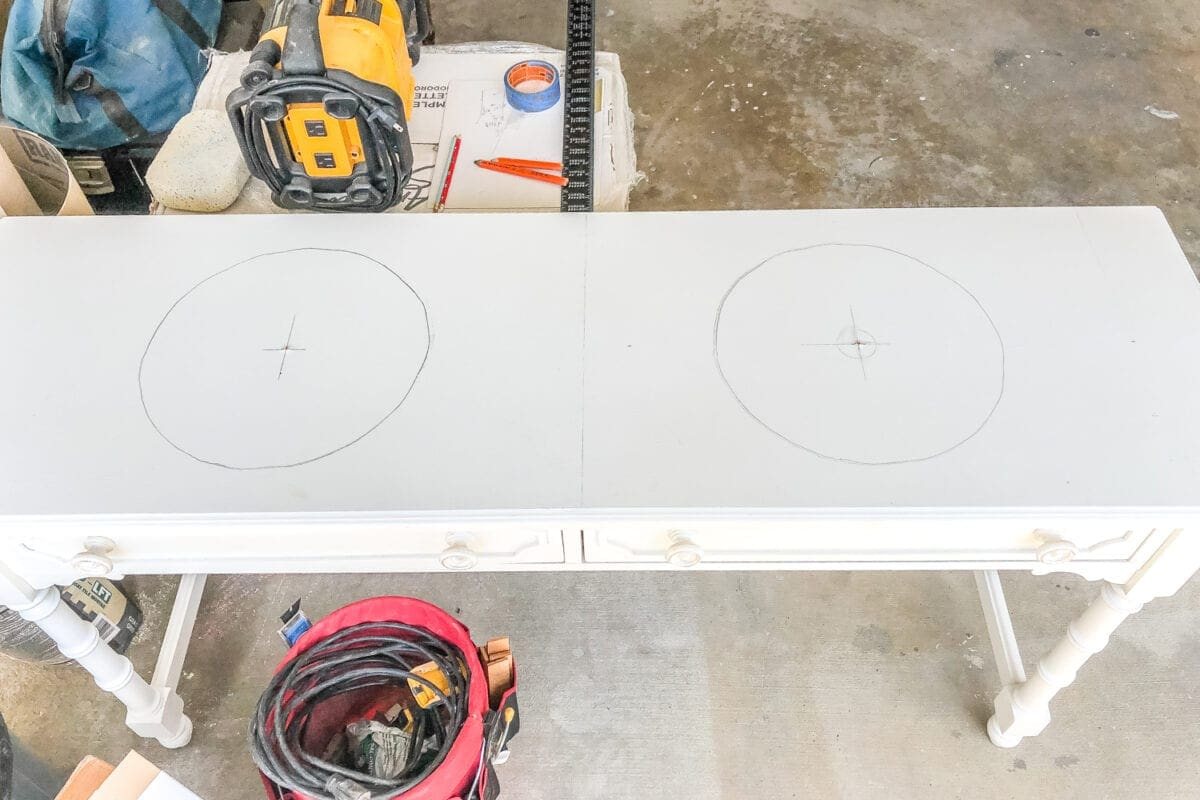 How to Turn a Console Table Into a Bathroom Vanity | unigumushane.com - A tutorial for how to reconstruct a console table to repurpose as a bathroom vanity and leave drawers functional underneath sinks.