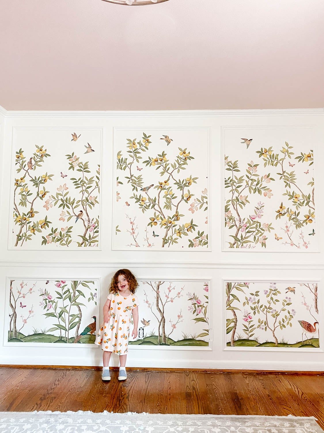 chinoiserie wallpaper in a girl's room