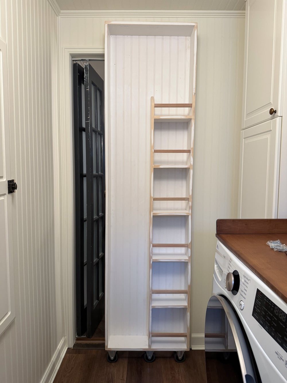 hidden broom cupboard diy