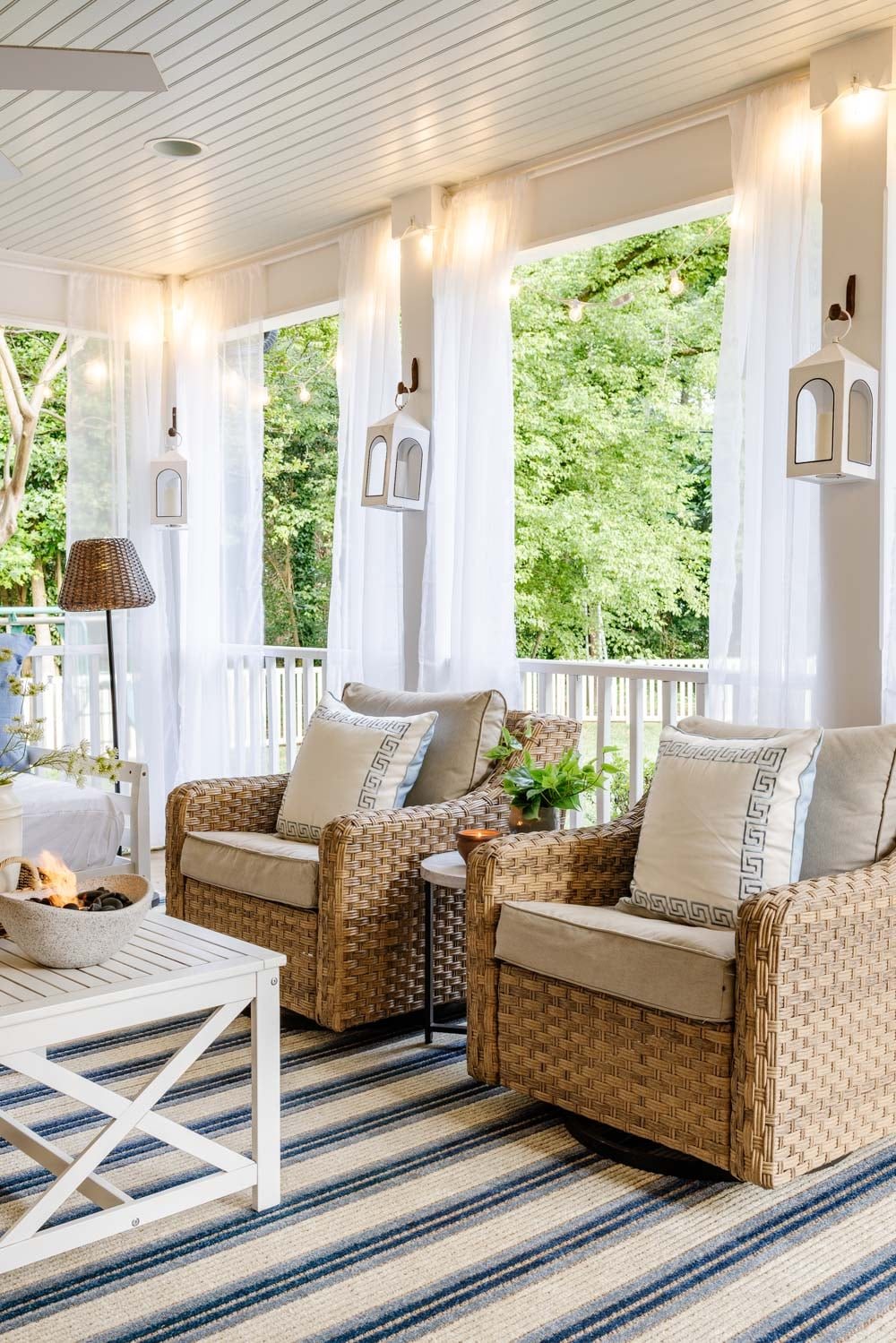 outdoor living room with fireplace on a back porch