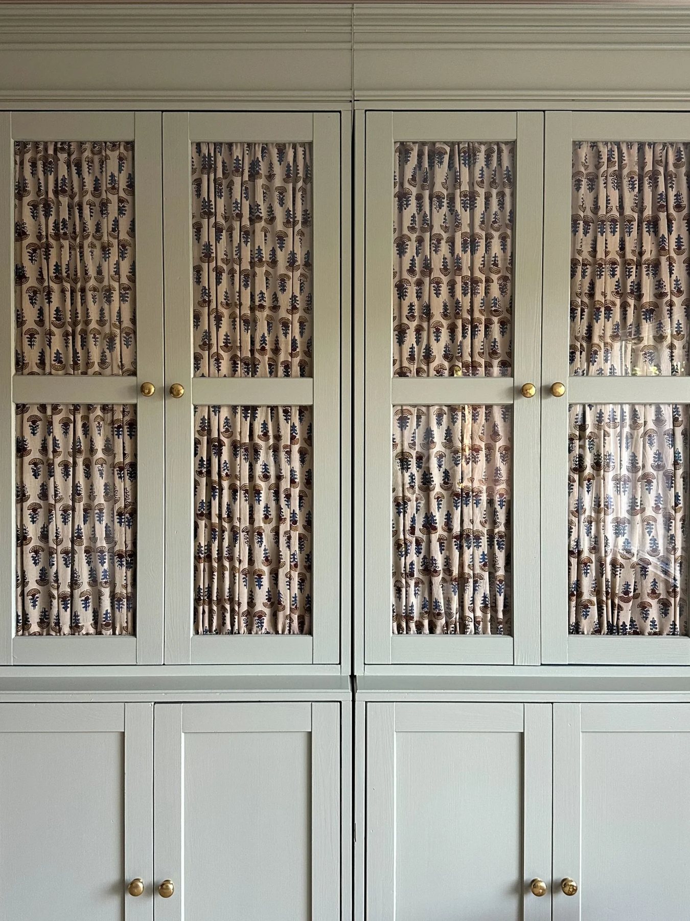 gathered fabric glass cabinets