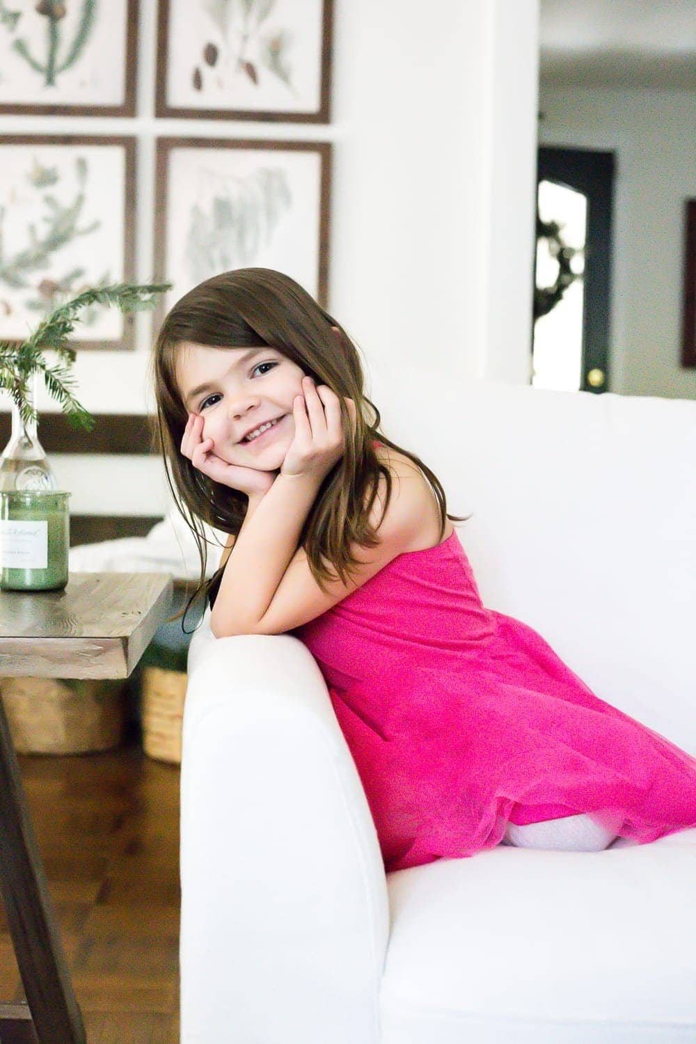 A complete review the IKEA Farlov sofa- how it holds up after 8 months with 2 dogs and a preschooler, the pros and cons of owning one, and tips to keep it looking bright white. #sofa #ikea #farlov #slipcover #furniture #livingroom