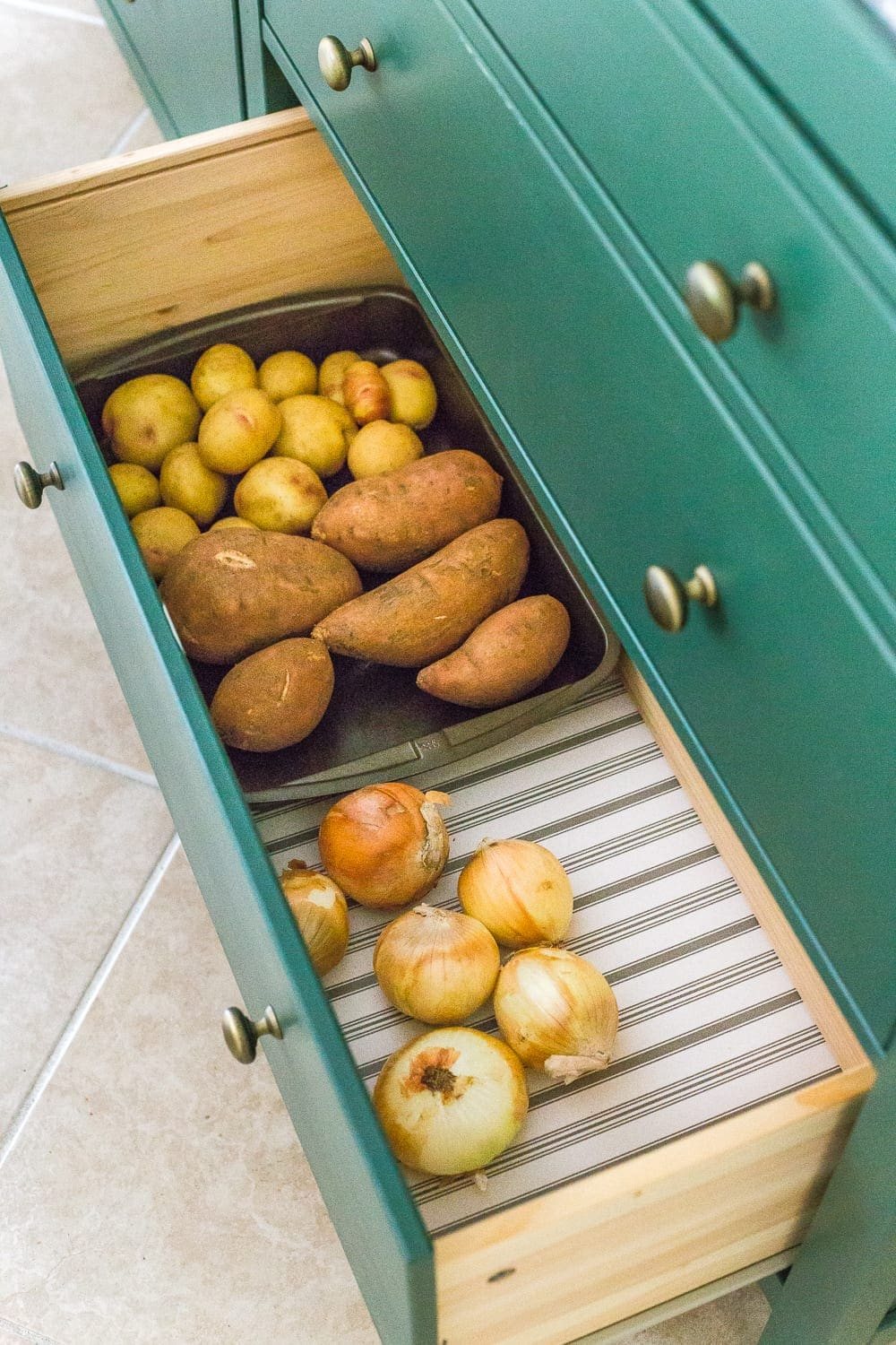 IKEA Hemnes Pantry Cabinet Organization - Tips and ideas for maximizing storage and creating function for food storage in a cabinet to repurpose as a pantry. #pantryorganization