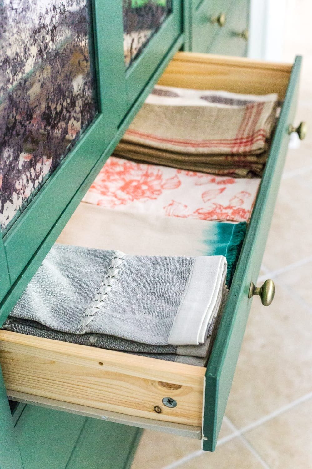 IKEA Hemnes Pantry Cabinet Organization - Tips and ideas for maximizing storage and creating function for food storage in a cabinet to repurpose as a pantry. #pantryorganization
