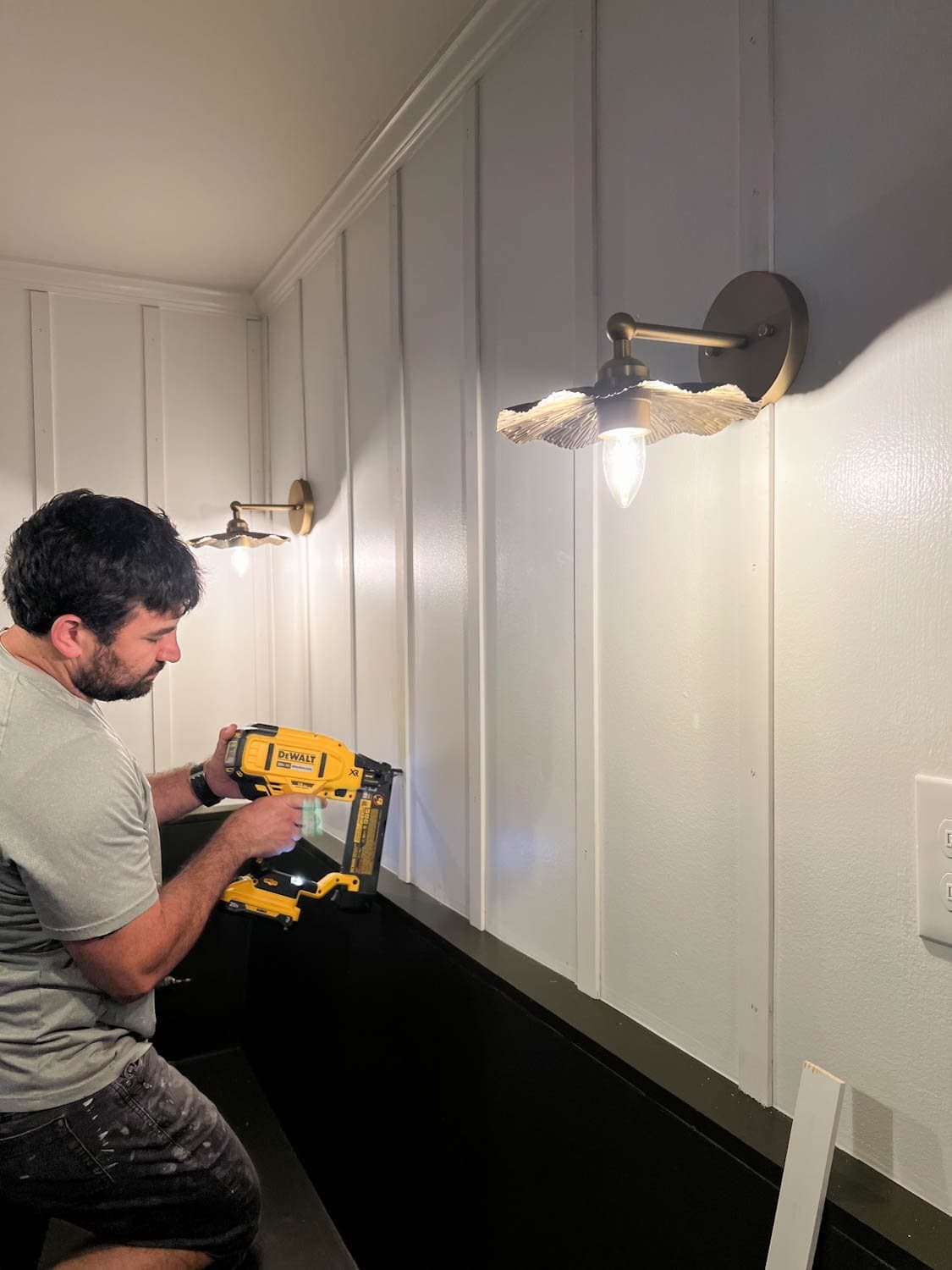 nailing lattice strips to a wall for DIY batten wall molding