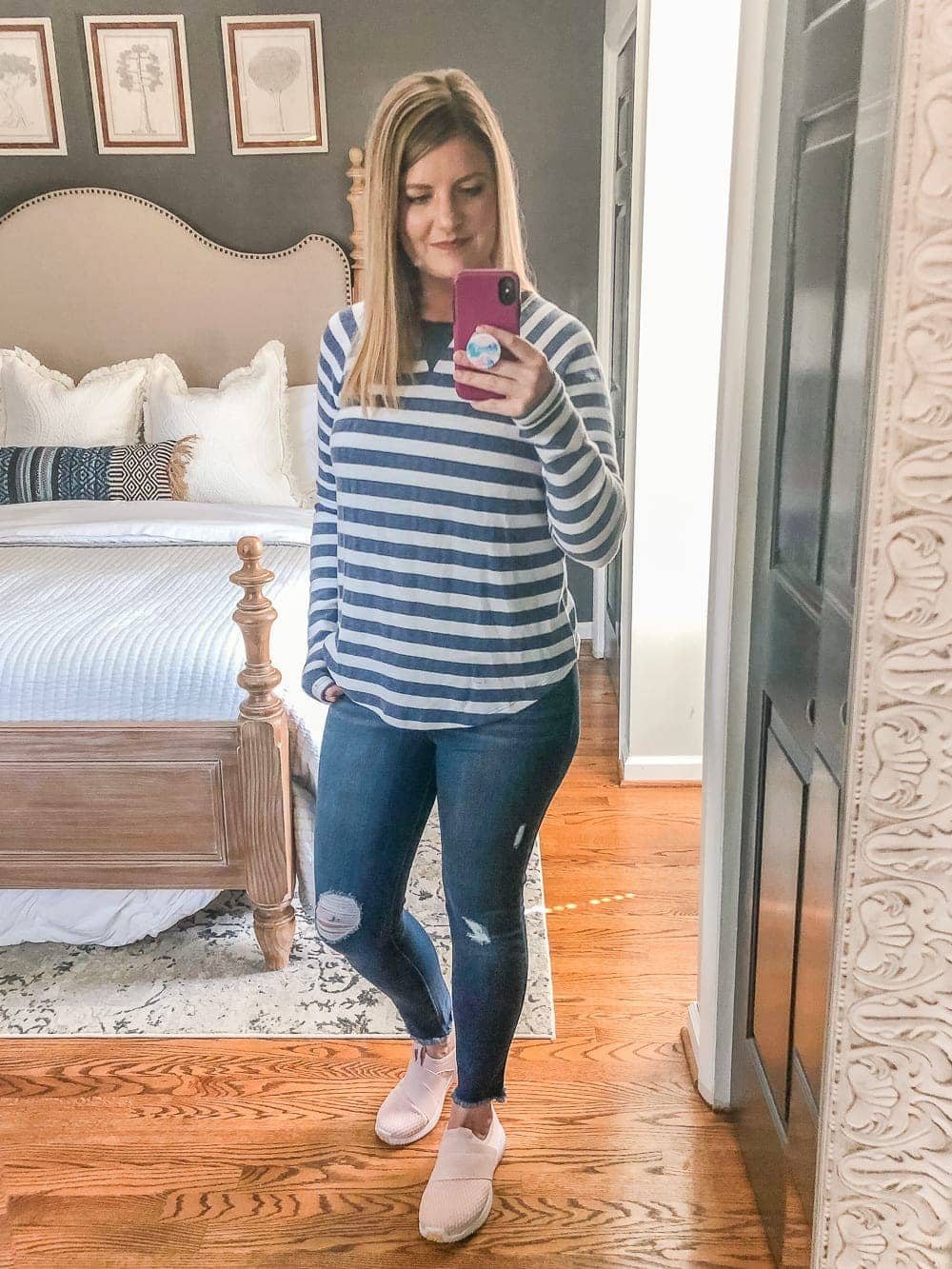 7 Inexpensive Tummy Hiding Mom Friendly Fall Outfits - Pullover shirt, distressed jeans, and slip-on sneakers