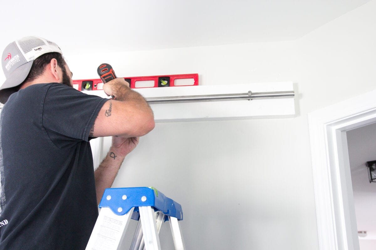How to Install Sliding Barn Doors | unigumushane.com - A quick tutorial to show how to install sliding barn doors in 5 easy steps using a door hardware kit from @NationalHardware. #sponsored