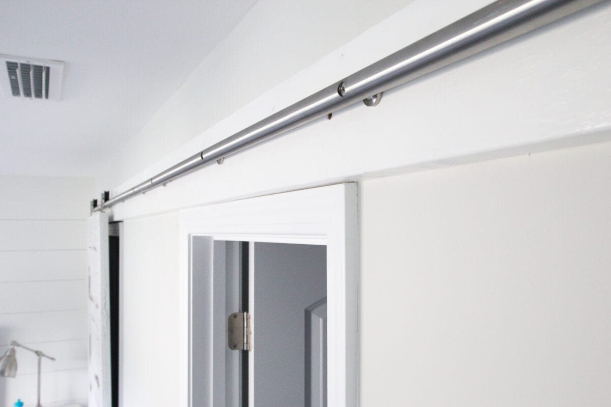 How to Install Sliding Barn Doors | unigumushane.com - A quick tutorial to show how to install sliding barn doors in 5 easy steps using a door hardware kit from @NationalHardware. #sponsored