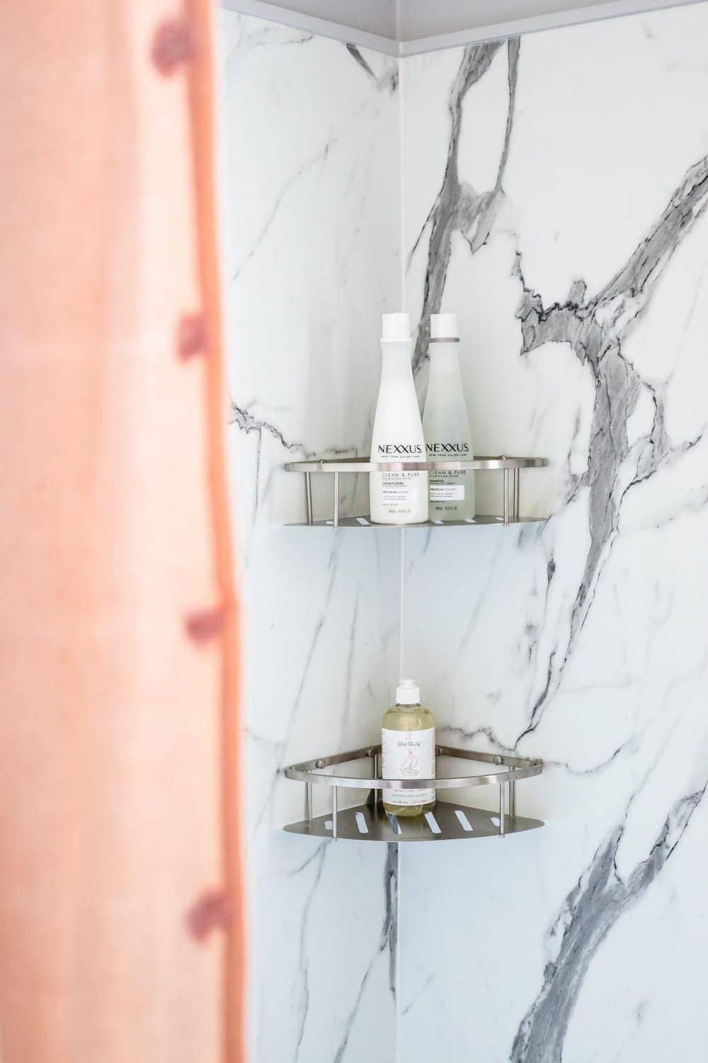 Whimsical, classic kids bathroom makeover | faux marble shower walls