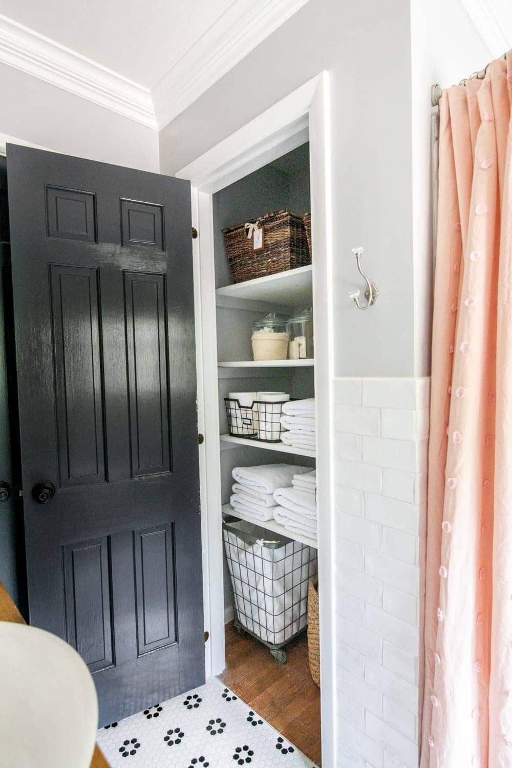 Whimsical, classic kids bathroom makeover | linen closet organization