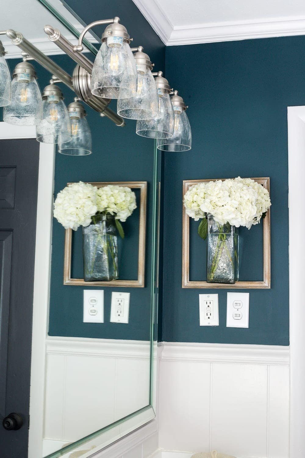 Kid's / Guest Bathroom Makeover on a Budget | unigumushane.com - A shared kid's / guest bathroom gets a full makeover for less than $500 using just paint, DIY tutorials, and decorating tricks. #bathroom #homeimprovement