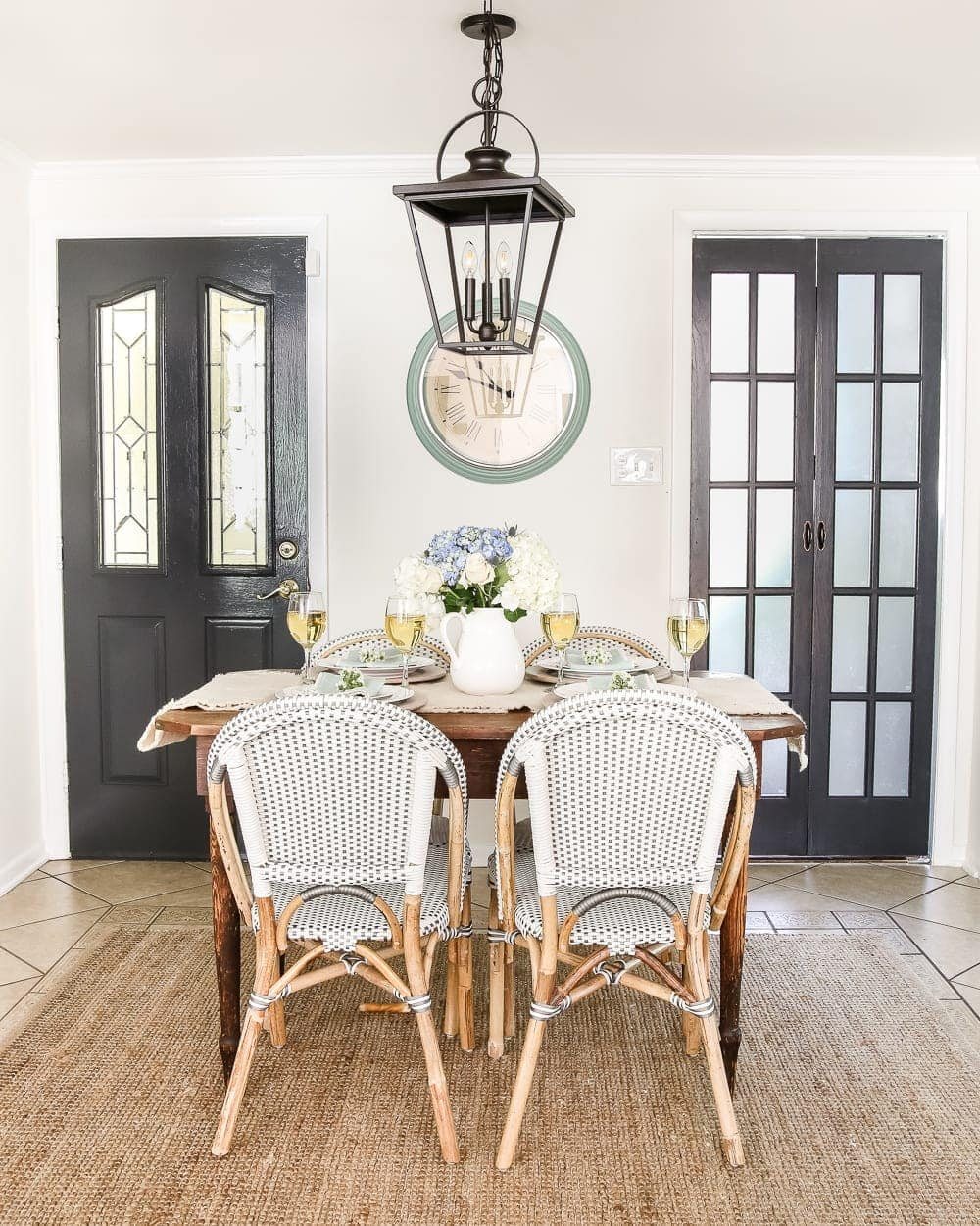Laundry Room Updates: French Bifold Door | unigumushane.com - A rickity laundry room bifold door gets a beautiful and functional update with a French bifold door with frosted glass for hiding messes in a stylish way.