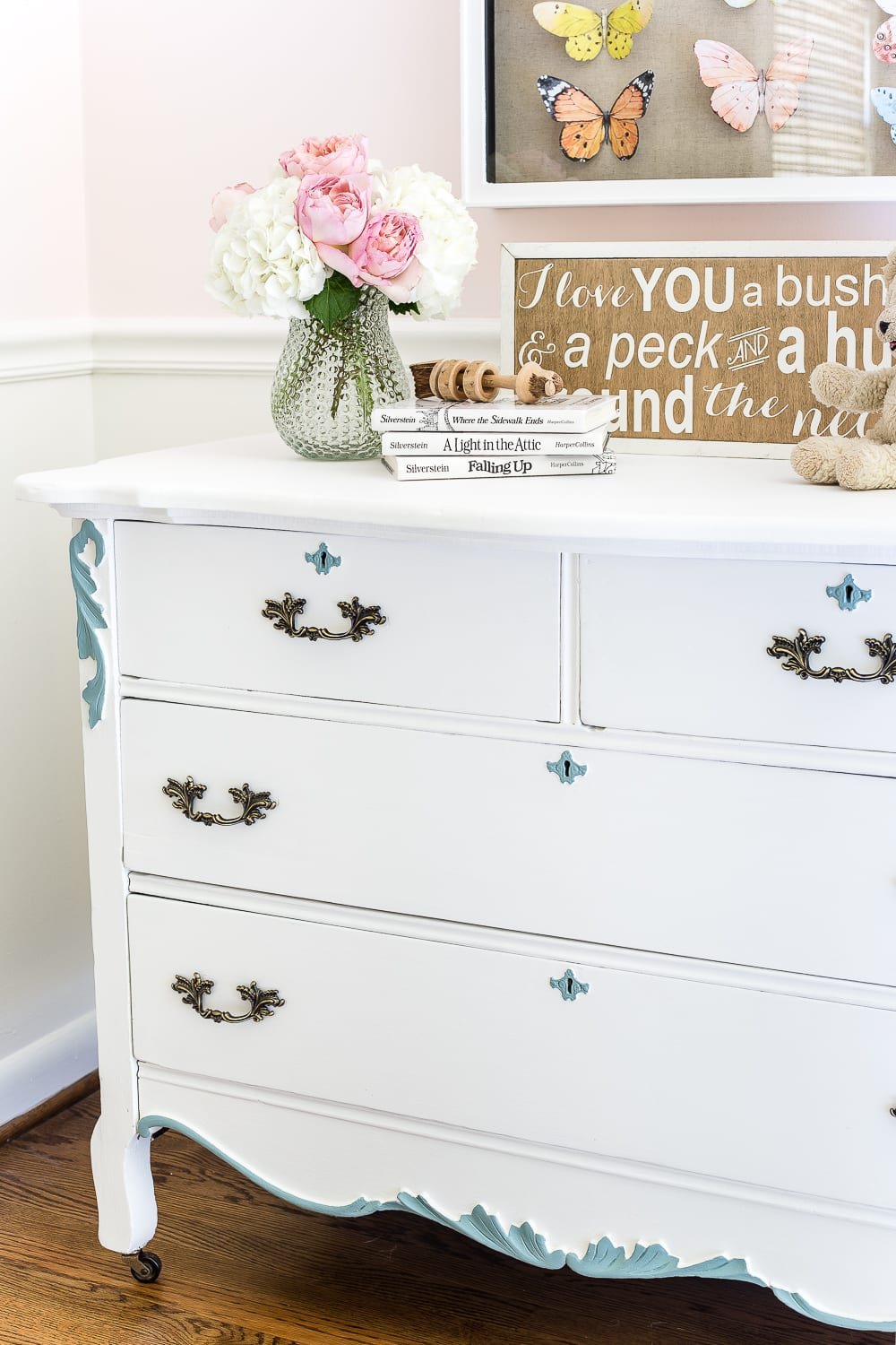 A little girl bedroom makeover with a butterfly theme full of thrifty makeovers, DIYable projects, and Anthropologie style knock-offs. #girlbedroom #littlegirlbedroom #girlroom #littlegirlroom #kidsspaces #kidsdecor #kidsroom #kidsdiy #bedroommakeover #kidsroommakeover #girlbedroommakeover