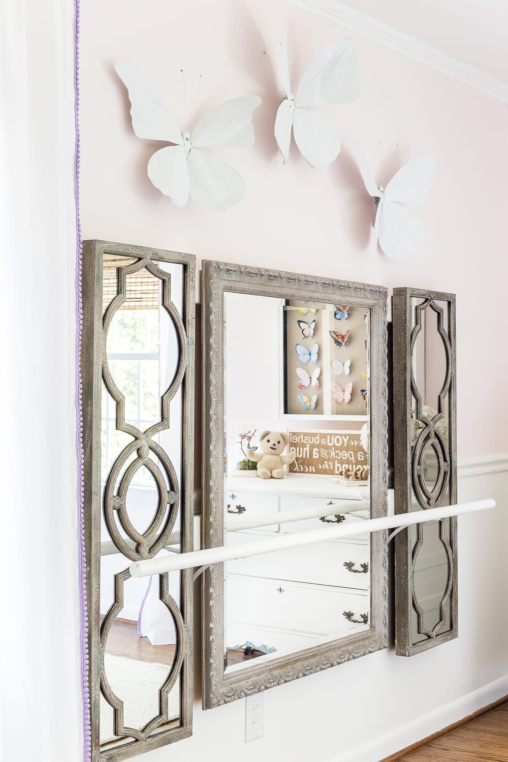 A little girl bedroom makeover with a butterfly theme full of thrifty makeovers, DIYable projects, and Anthropologie style knock-offs. #girlbedroom #littlegirlbedroom #girlroom #littlegirlroom #kidsspaces #kidsdecor #kidsroom #kidsdiy #bedroommakeover #kidsroommakeover #girlbedroommakeover