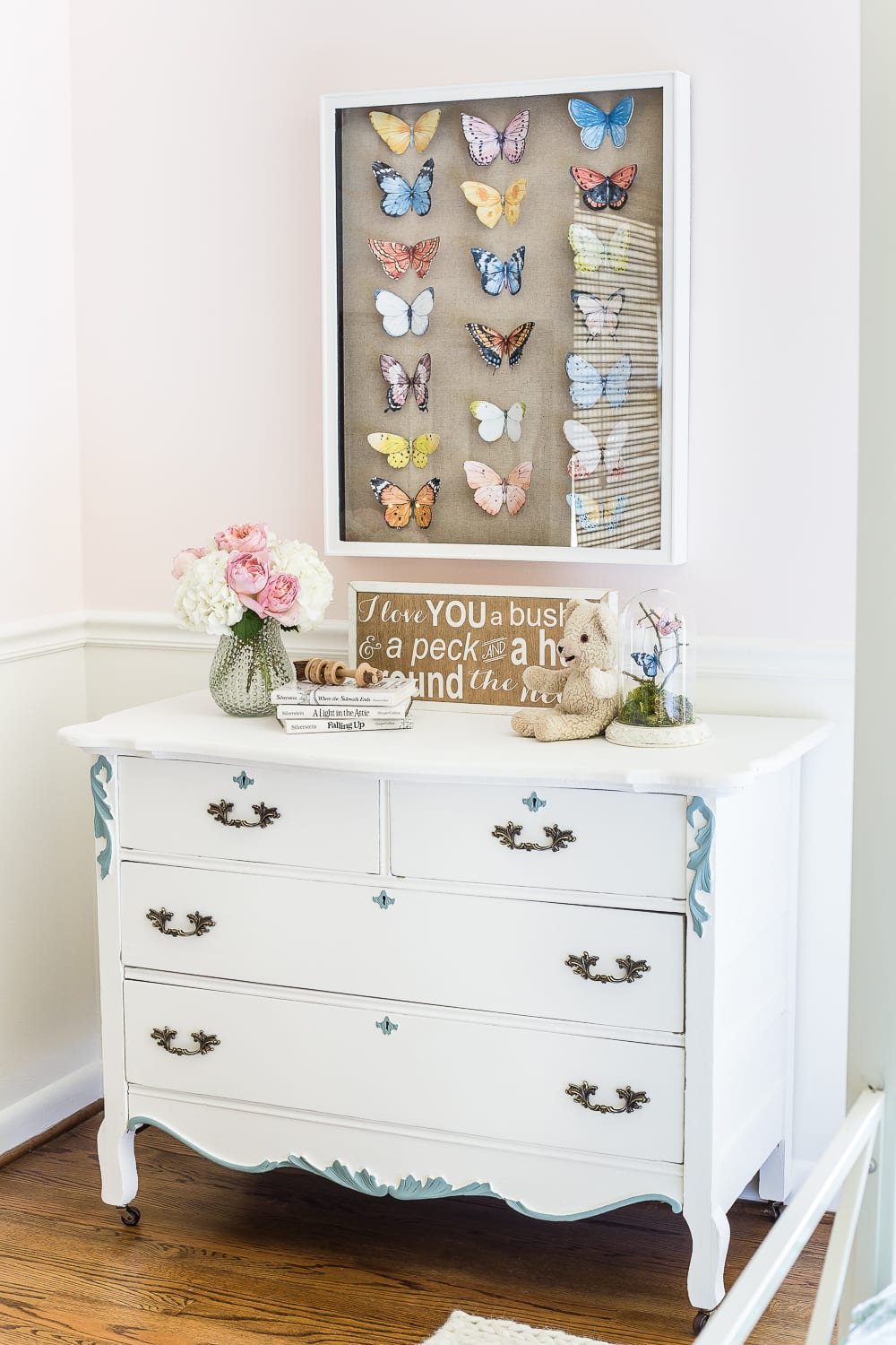 A little girl bedroom makeover with a butterfly theme full of thrifty makeovers, DIYable projects, and Anthropologie style knock-offs. #girlbedroom #littlegirlbedroom #girlroom #littlegirlroom #kidsspaces #kidsdecor #kidsroom #kidsdiy #bedroommakeover #kidsroommakeover #girlbedroommakeover