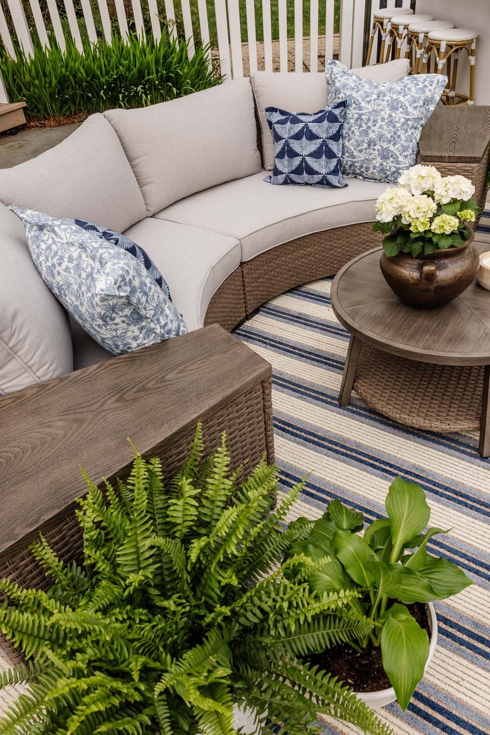 curved outdoor furniture with storage tables