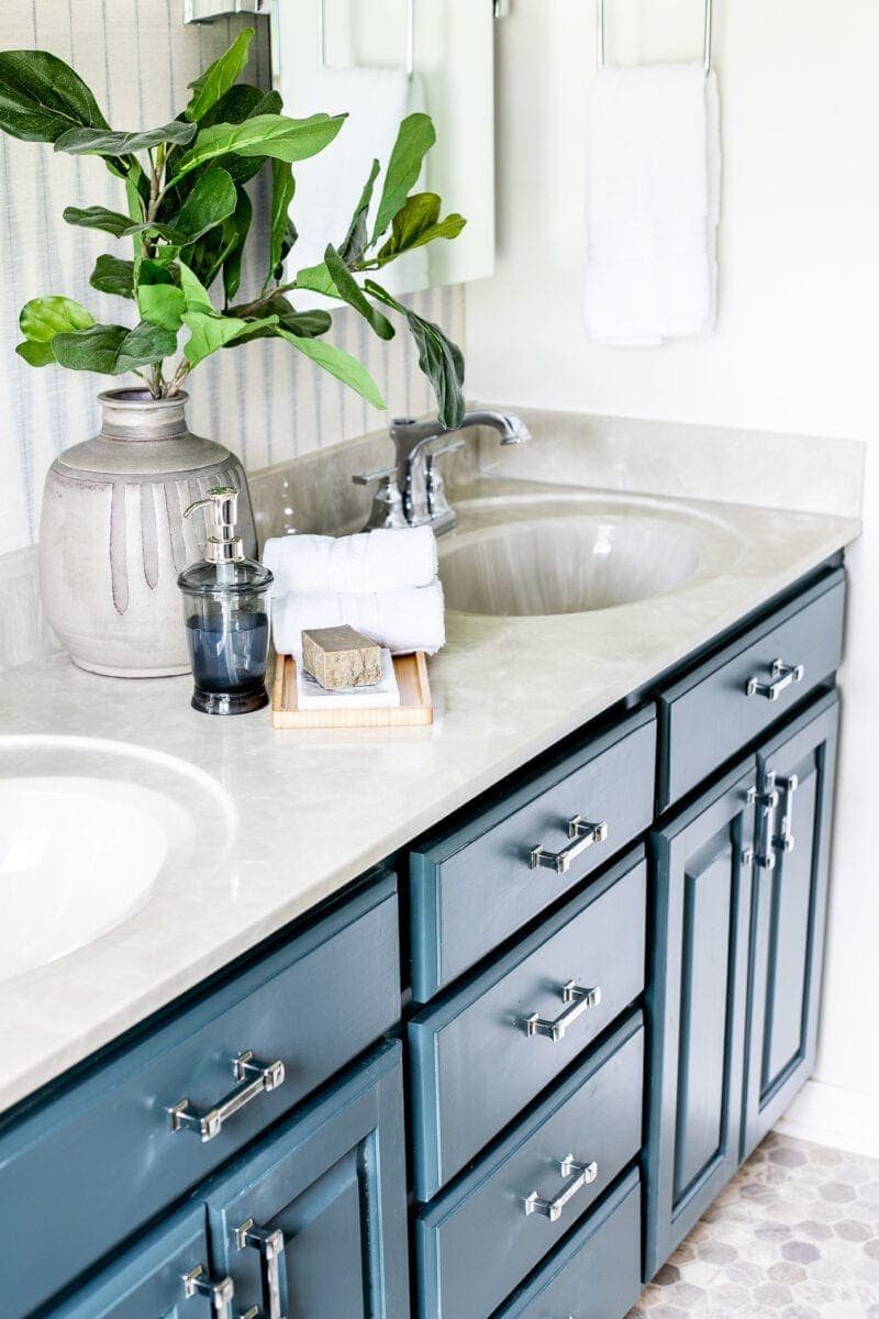 Master Bathroom Refresh | A dated master bathroom gets a quick and inexpensive modern refresh using paint, wallpaper, sheet vinyl, and hardware.