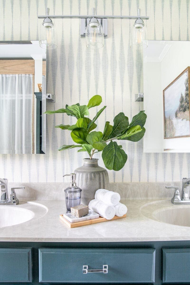 Master Bathroom Refresh | A dated master bathroom gets a quick and inexpensive modern refresh using paint, wallpaper, sheet vinyl, and hardware.
