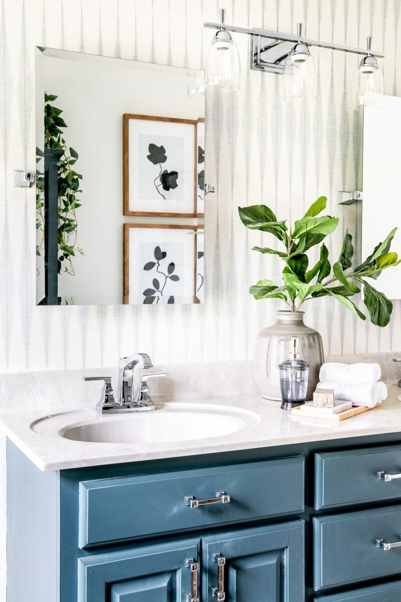 Master Bathroom Refresh | A dated master bathroom gets a quick and inexpensive modern refresh using paint, wallpaper, sheet vinyl, and hardware.