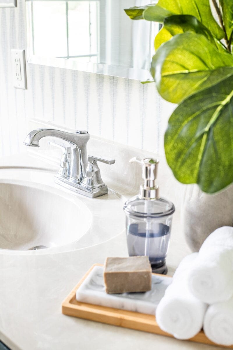 Master Bathroom Refresh | A dated master bathroom gets a quick and inexpensive modern refresh using paint, wallpaper, sheet vinyl, and hardware.