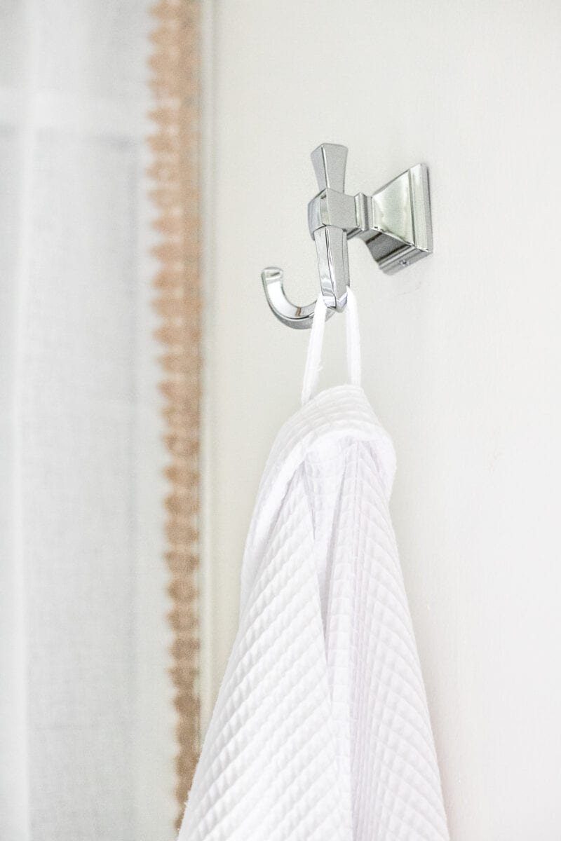 Master Bathroom Refresh | A dated master bathroom gets a quick and inexpensive modern refresh using paint, wallpaper, sheet vinyl, and hardware.