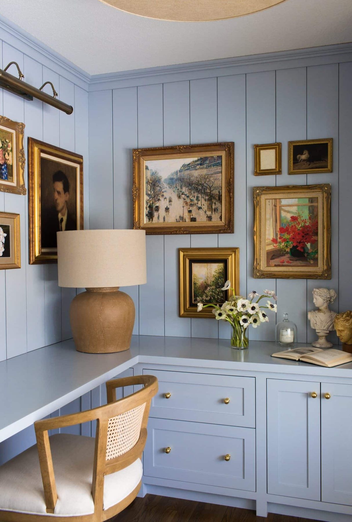 built in desks with gallery wall