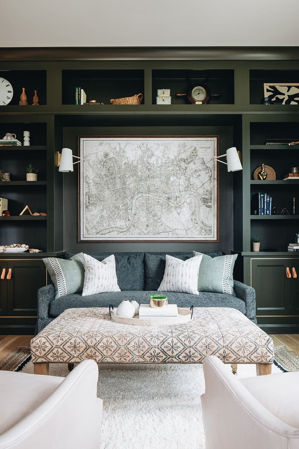 sofa surrounded by built in shelves